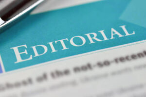 Heading a Editorial in the newpaper. Concept Editorial. Shallow DOF.